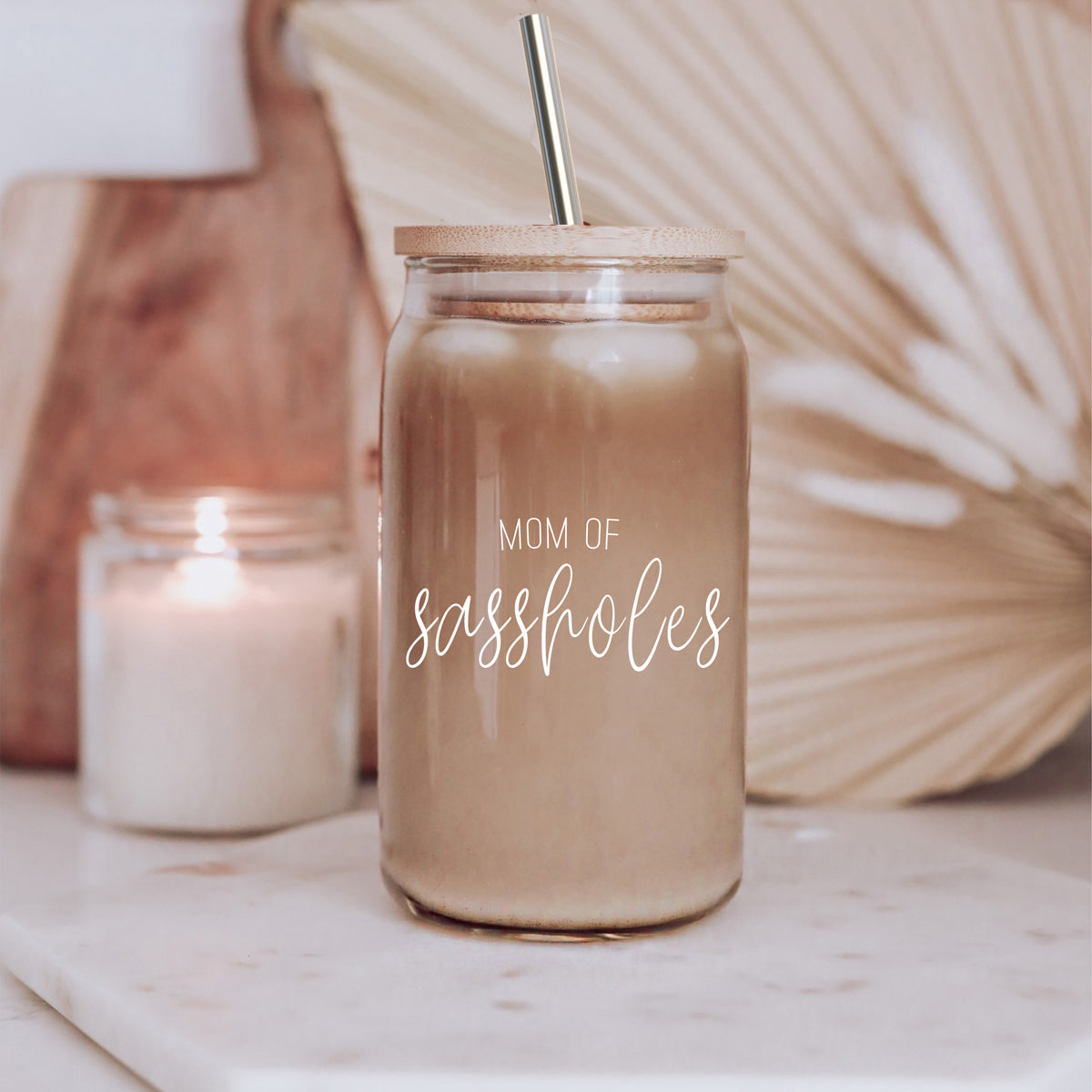 Mom of Sassholes Set featuring stylish glass cups with bamboo lids, stainless steel straws, and a straw cleaner, perfect for sassy moms.