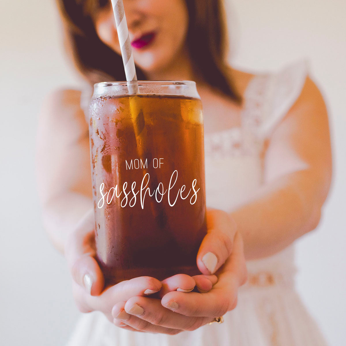 Mom of Sassholes Set featuring stylish glass cups with bamboo lids, stainless steel straws, and a straw cleaner, perfect for sassy moms.