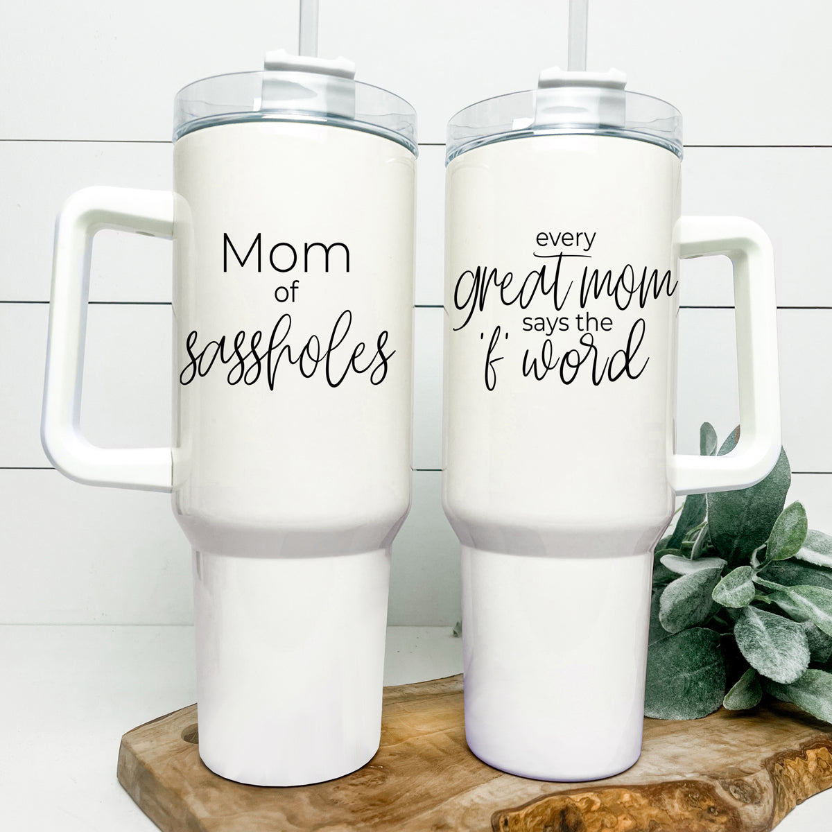 Mom Says the F Word 40oz insulated mug with a matte cream finish, featuring a black graphic design, a removable 3-in-1 lid, and a plastic straw.