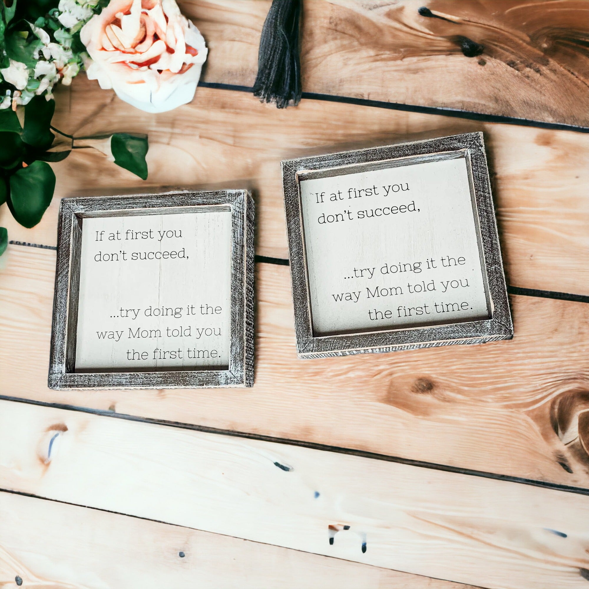 A wooden sign framed in wood, measuring 7x7 inches, featuring a humorous quote about motherhood, suitable for wall hanging or standing display.