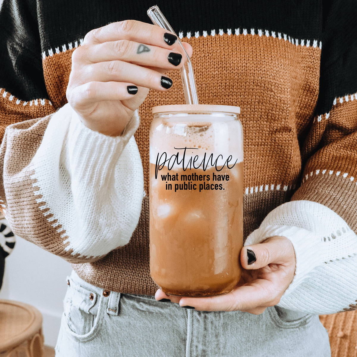 Patience in Public Set featuring a glass cup with bamboo lid, stainless steel straws, and a straw cleaner, showcasing its elegant design and functionality.