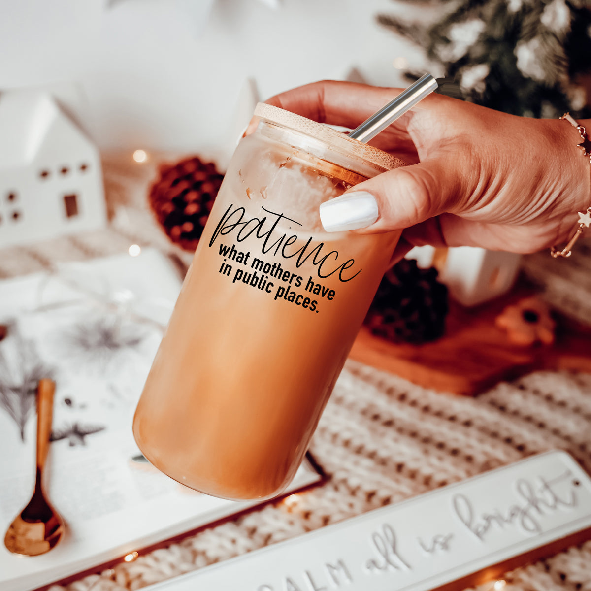 Patience in Public Set featuring a glass cup with bamboo lid, stainless steel straws, and a straw cleaner, showcasing its elegant design and functionality.