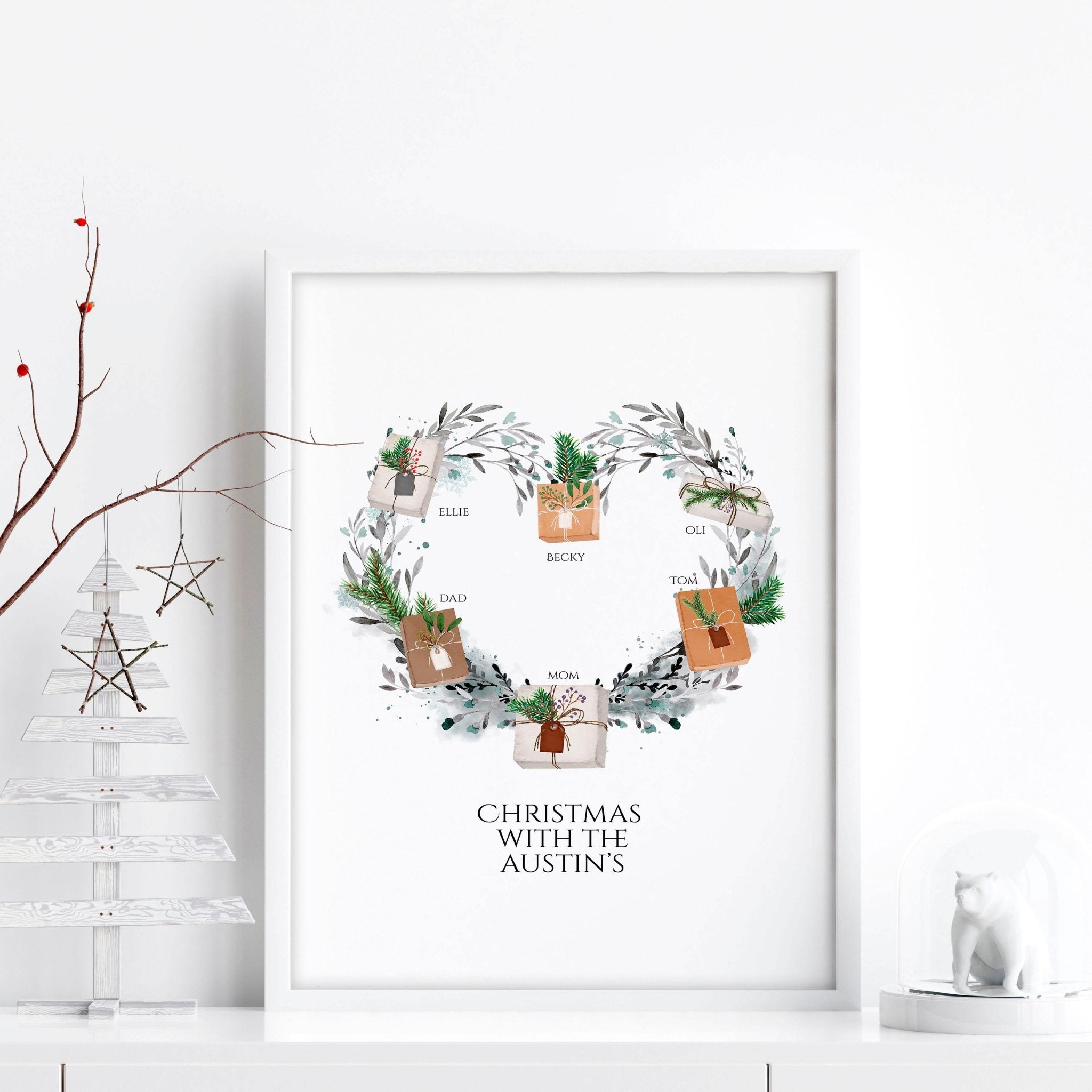 Personalized family wall art featuring a watercolour wreath with gift boxes, customizable with family names and a quote.