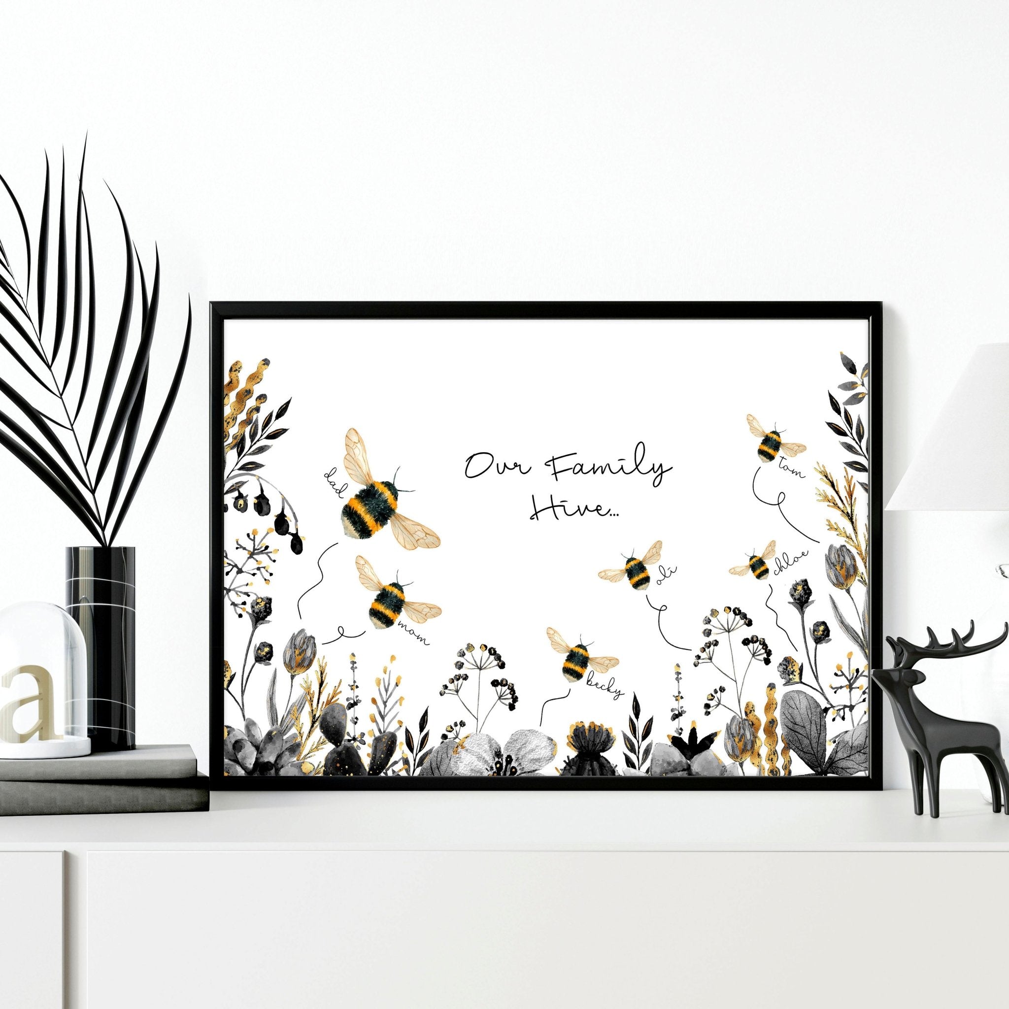 Personalized Bumble Bee wall art print featuring a buzzing hive and elegant bumble bees, customizable with family names, stylish black, grey, and gold design.