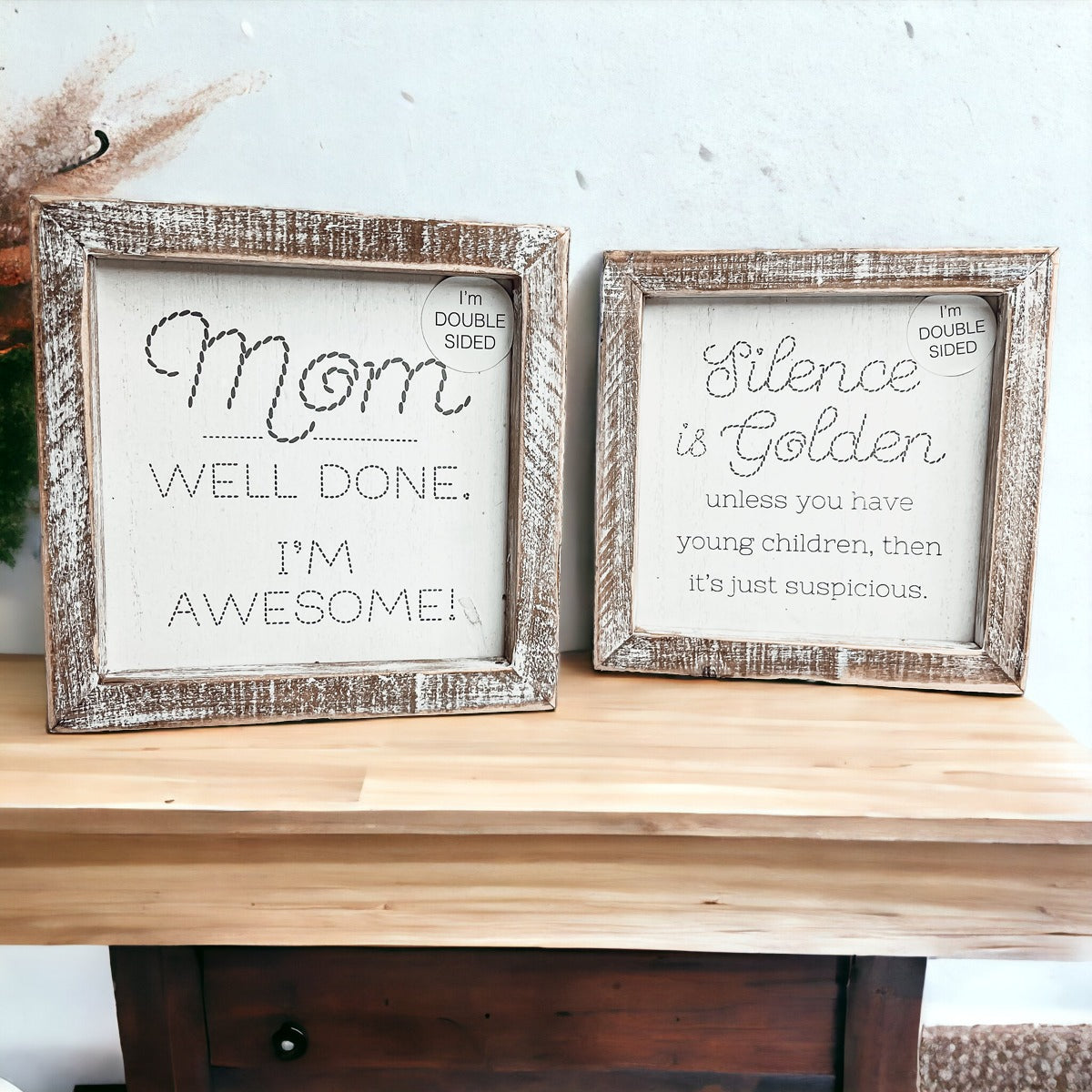 Double-sided 6-inch sign featuring humorous motherhood quotes, one side says 'I'm Awesome!' and the other 'Silence is Golden. Unless you have children, then it's just suspicious.'