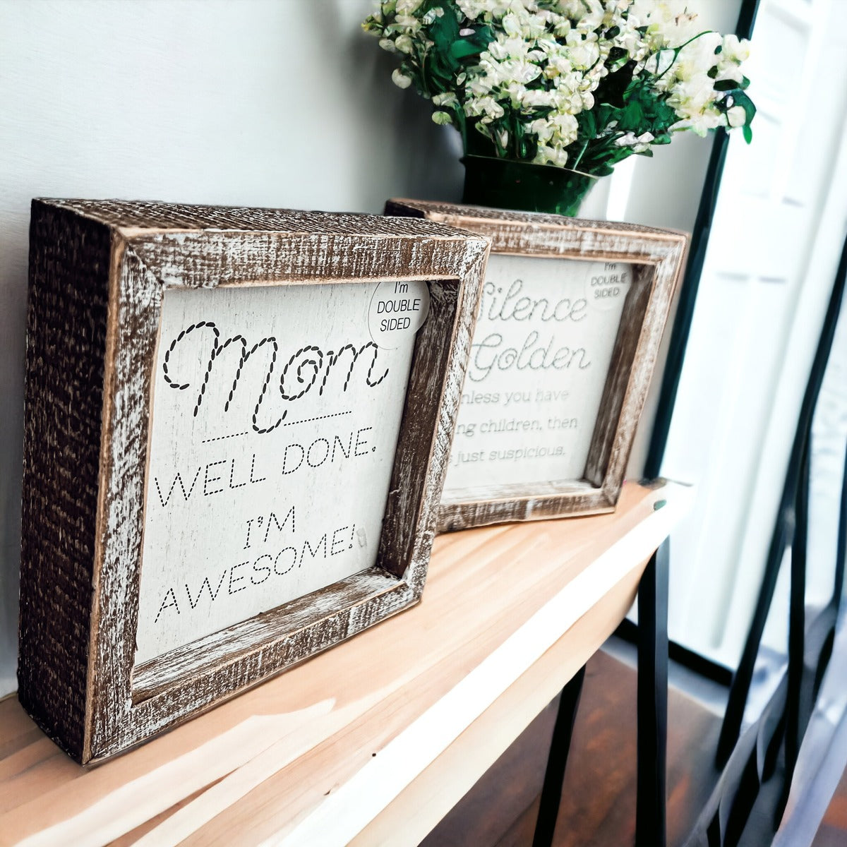 Double-sided 6-inch sign featuring humorous motherhood quotes, one side says 'I'm Awesome!' and the other 'Silence is Golden. Unless you have children, then it's just suspicious.'