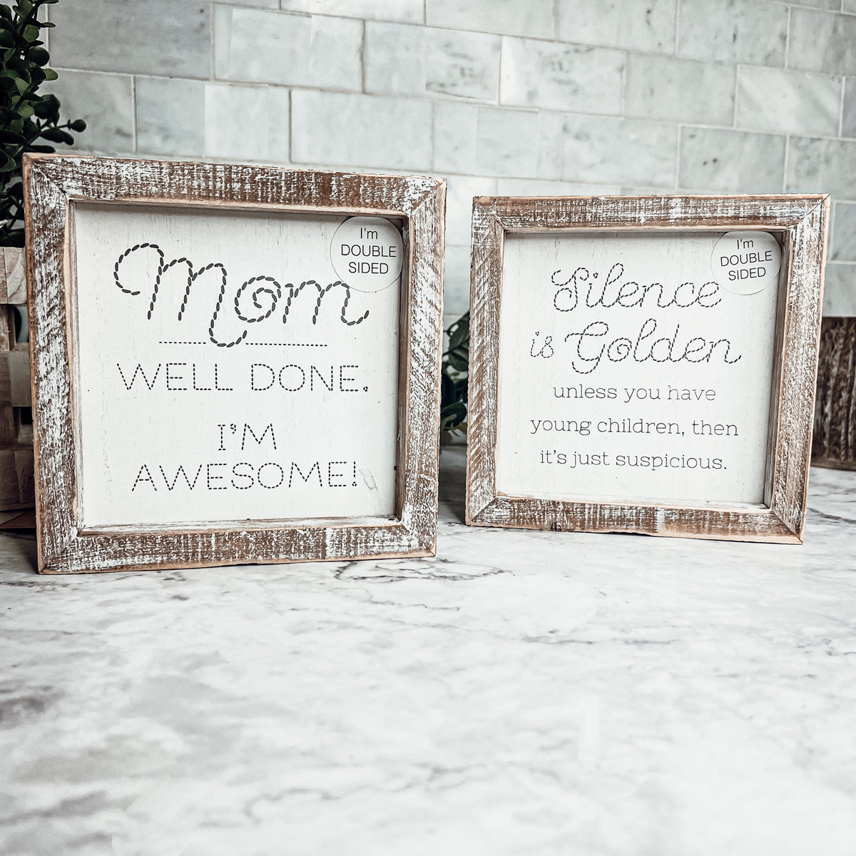 Double-sided 6-inch sign featuring humorous motherhood quotes, one side says 'I'm Awesome!' and the other 'Silence is Golden. Unless you have children, then it's just suspicious.'