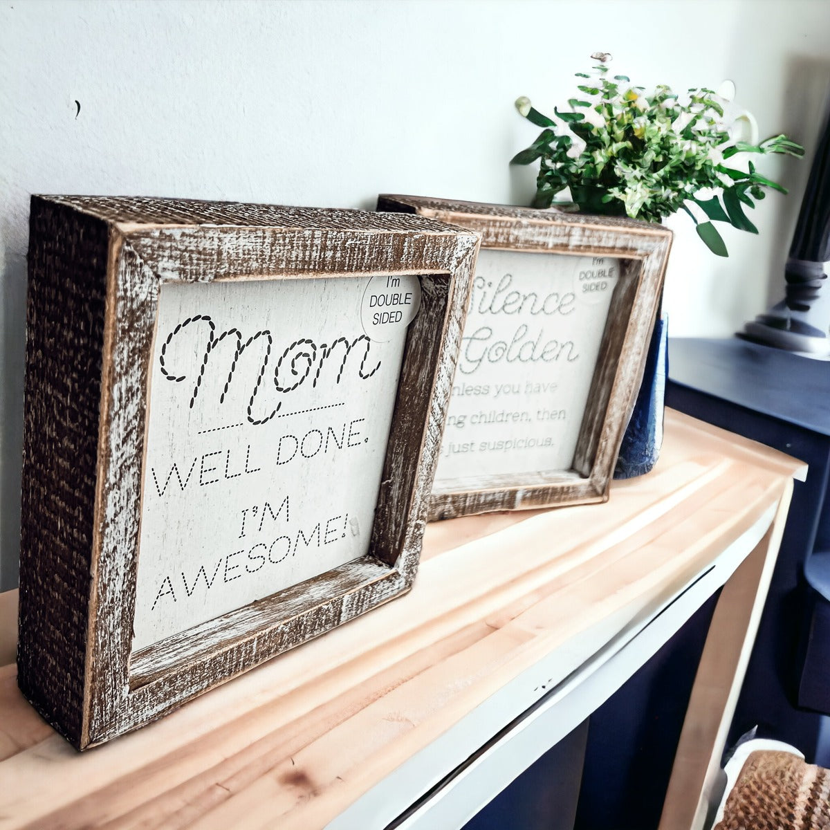 Double-sided 6-inch sign featuring humorous motherhood quotes, one side says 'I'm Awesome!' and the other 'Silence is Golden. Unless you have children, then it's just suspicious.'