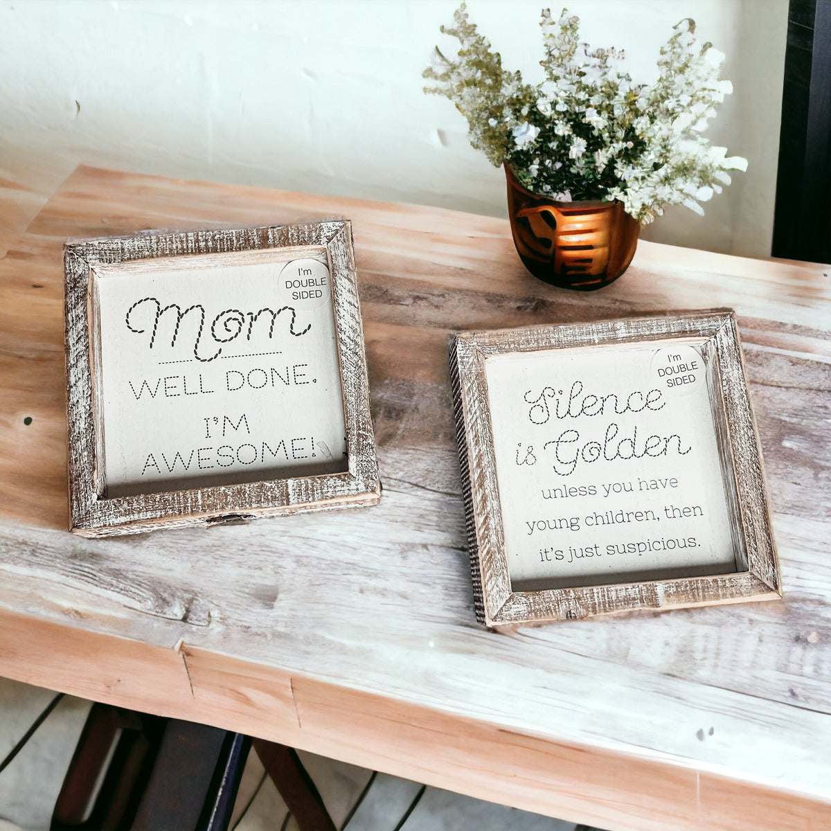 Double-sided 6-inch sign featuring humorous motherhood quotes, one side says 'I'm Awesome!' and the other 'Silence is Golden. Unless you have children, then it's just suspicious.'