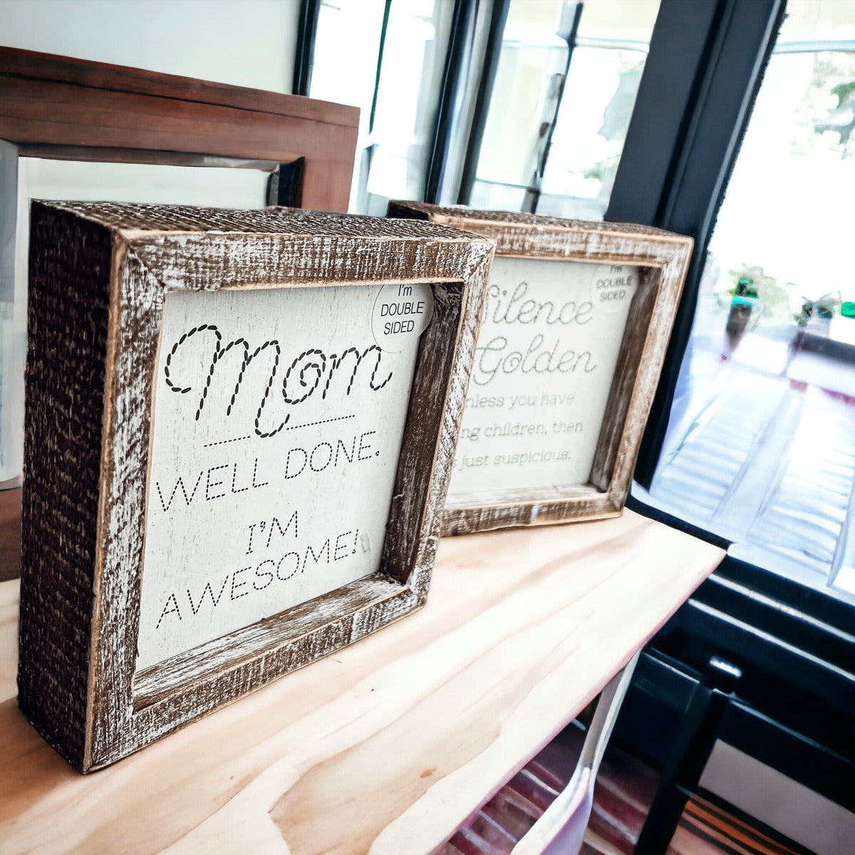 Double-sided 6-inch sign featuring humorous motherhood quotes, one side says 'I'm Awesome!' and the other 'Silence is Golden. Unless you have children, then it's just suspicious.'