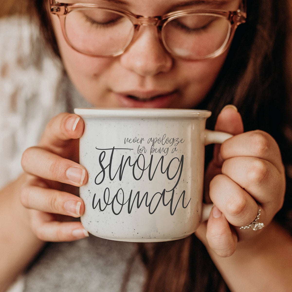 Strong Woman 14.5oz ceramic campfire mug with white sesame glaze and black lettering, designed for strong women.