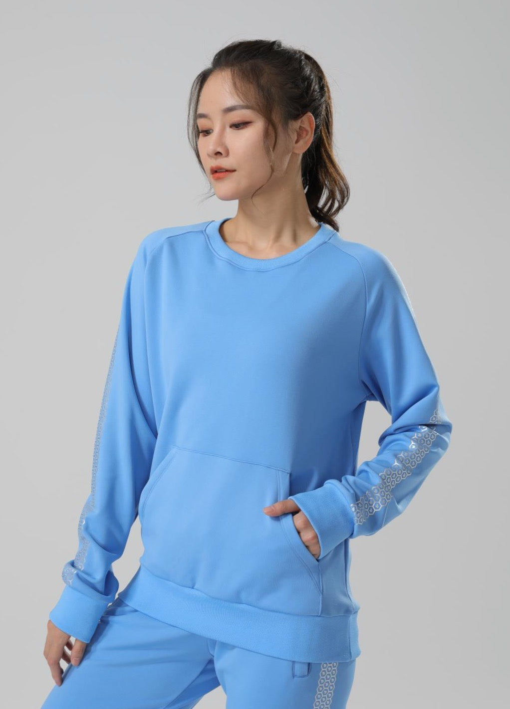 Women's CoreD Pro Sweatshirt featuring a brushed interior, kangaroo pocket, and wide ribbon cuffs in rich colors.