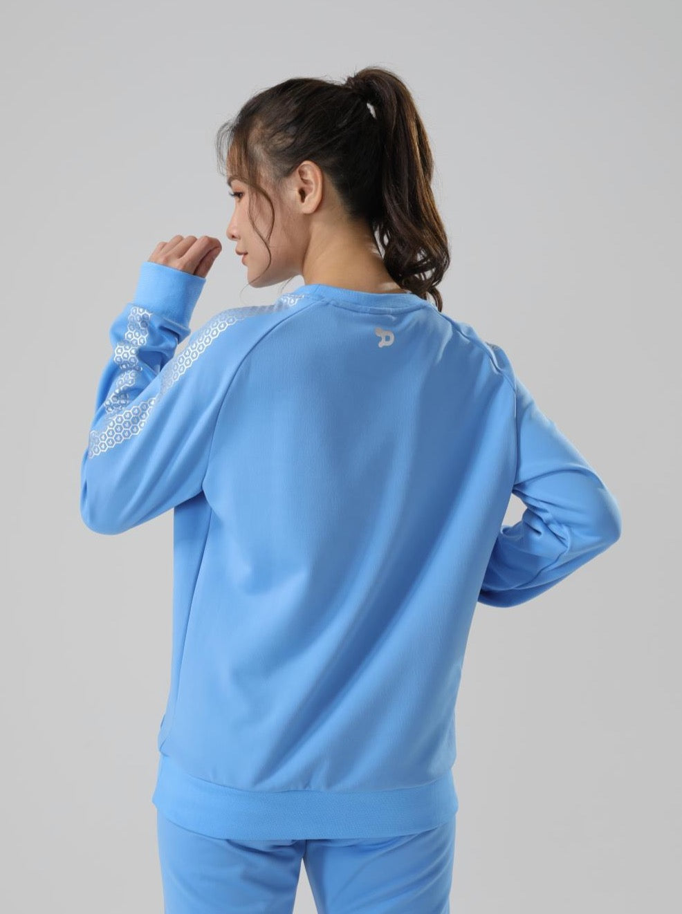 Women's CoreD Pro Sweatshirt featuring a brushed interior, kangaroo pocket, and wide ribbon cuffs in rich colors.