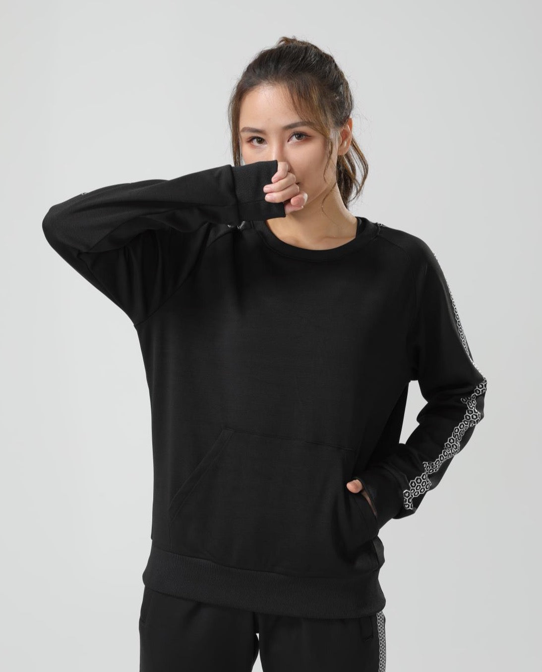 Women's CoreD Pro Sweatshirt featuring a brushed interior, kangaroo pocket, and wide ribbon cuffs in rich colors.