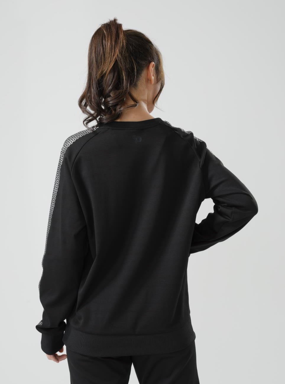 Women's CoreD Pro Sweatshirt featuring a brushed interior, kangaroo pocket, and wide ribbon cuffs in rich colors.