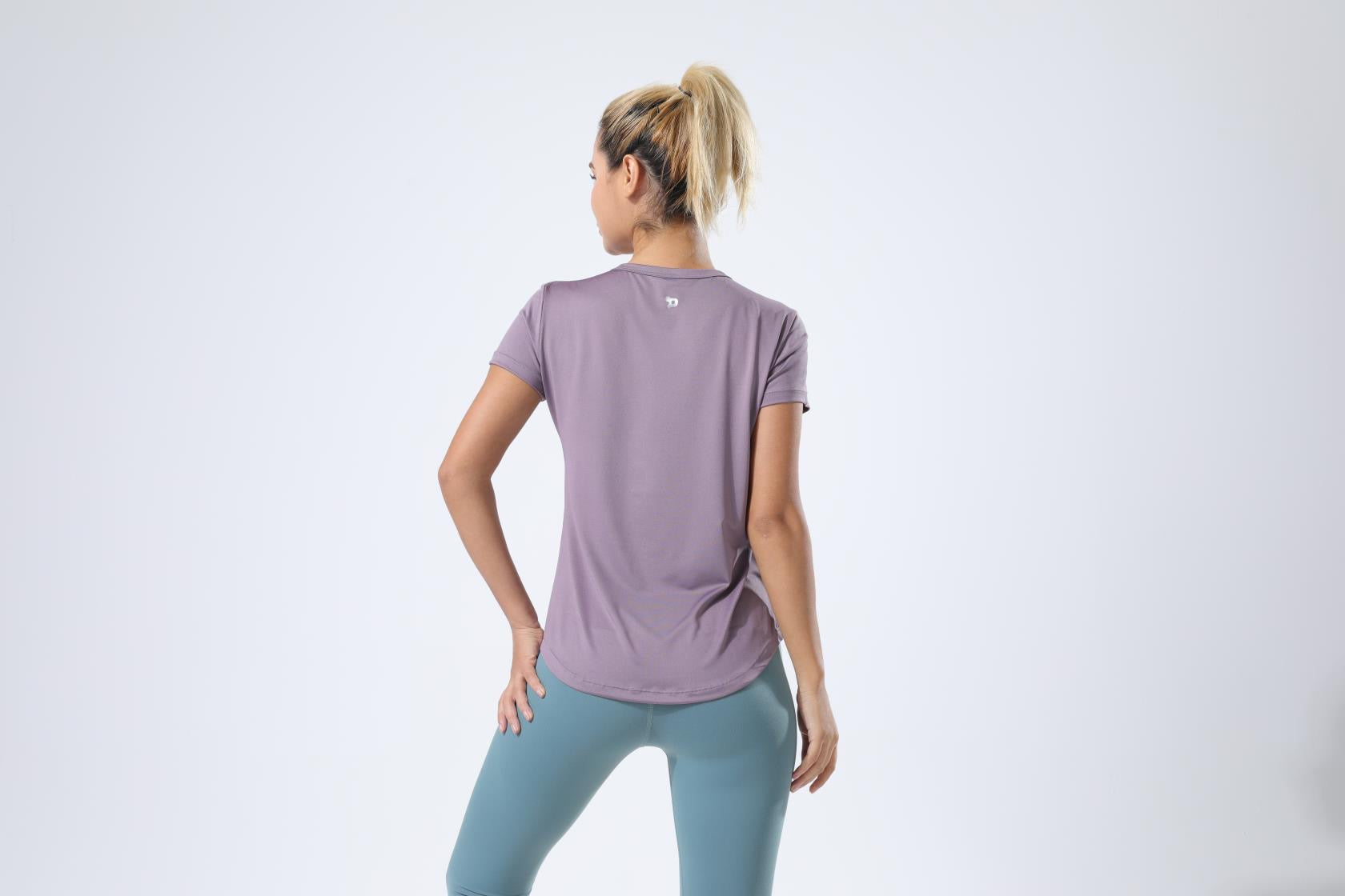 HauteD DK Tee featuring a stylish athletic silhouette with a roomy crew neck, made from breathable 180-gsm fabric.