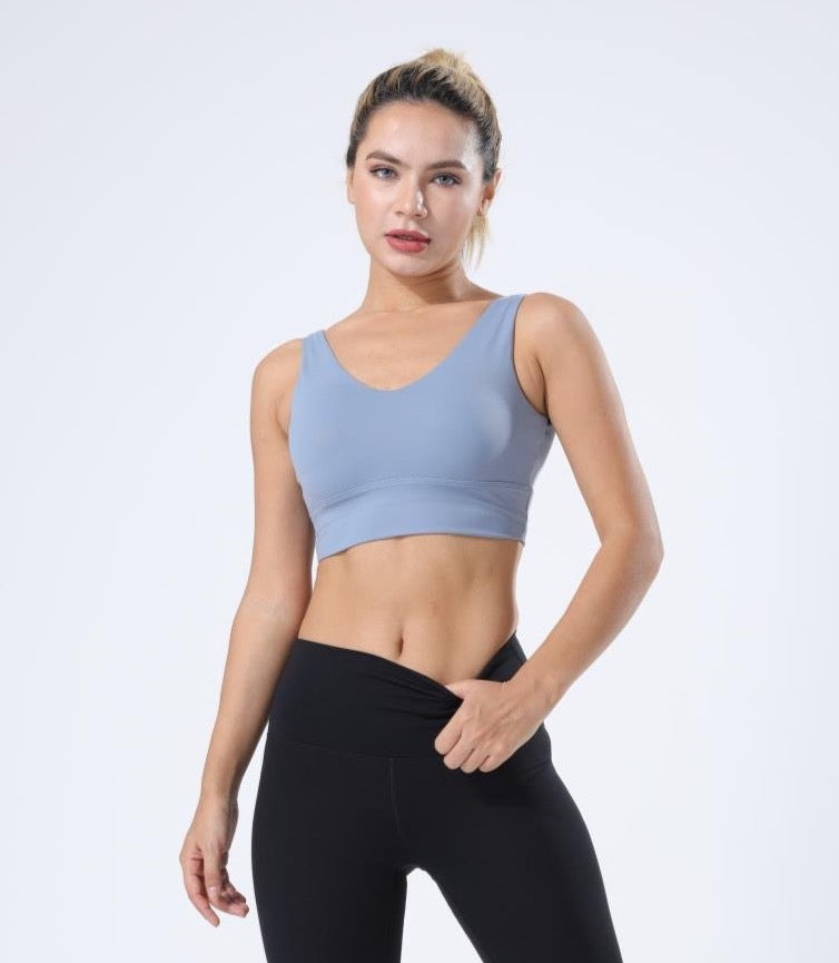 HauteD DK Victory Sports Bra featuring a deep V back design, providing stylish support for workouts.