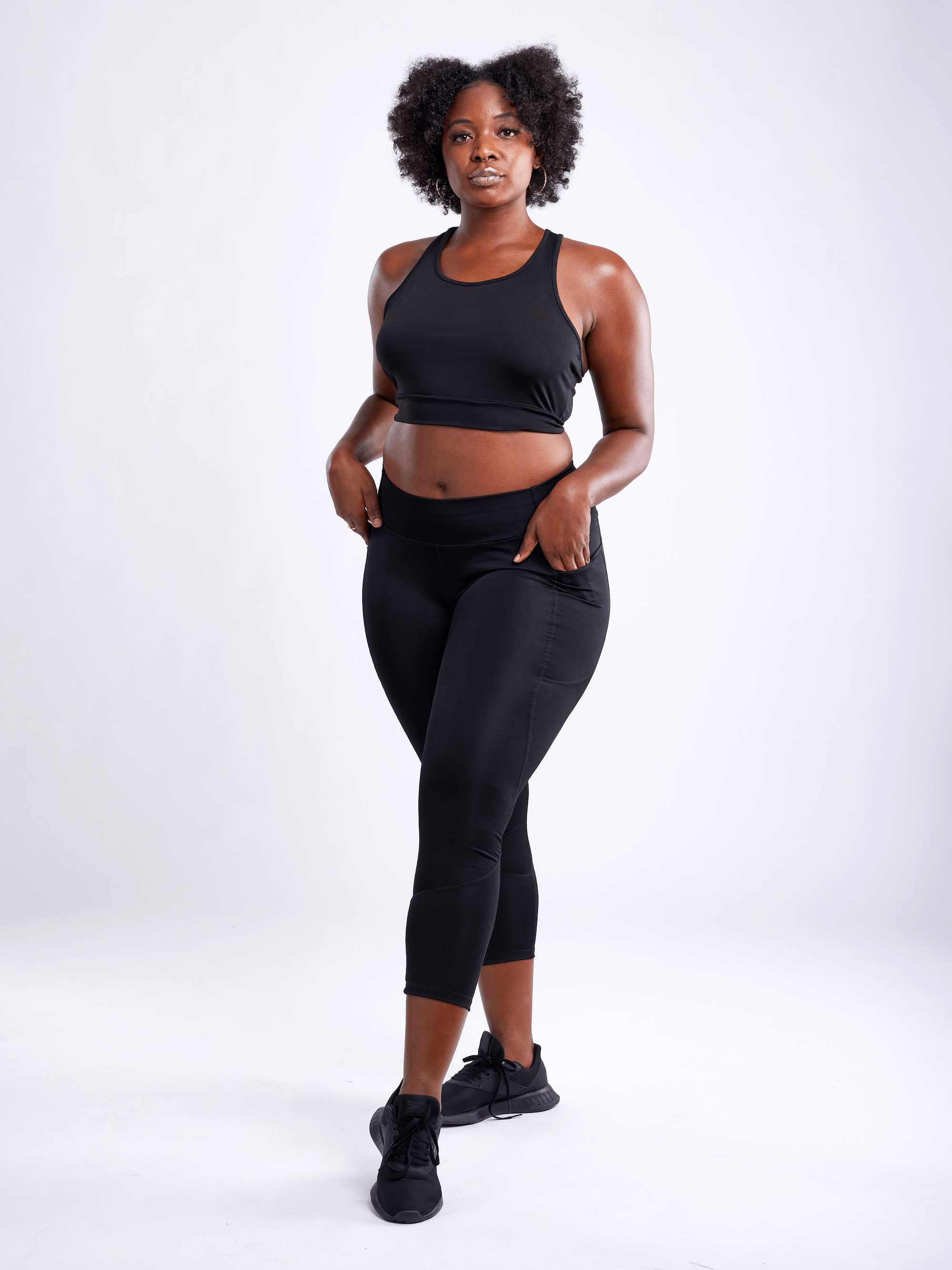 High-Waisted Classic Gym Leggings with Side Pockets for Women, featuring a smooth fabric, high waistband, and large side pockets for essentials.