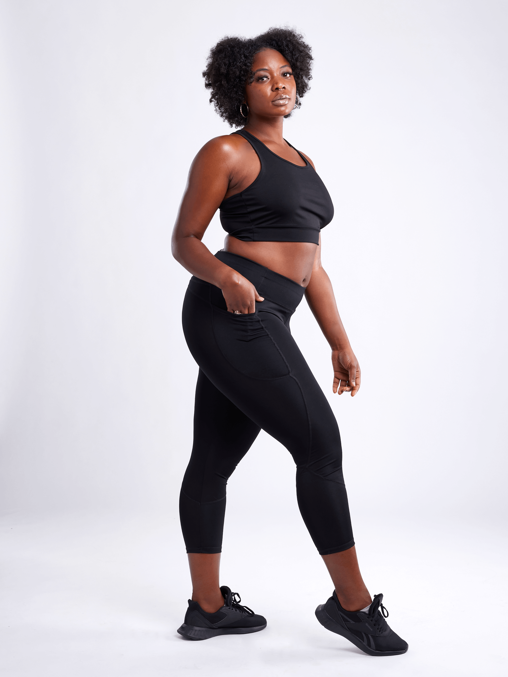 High-Waisted Classic Gym Leggings with Side Pockets for Women, featuring a smooth fabric, high waistband, and large side pockets for essentials.