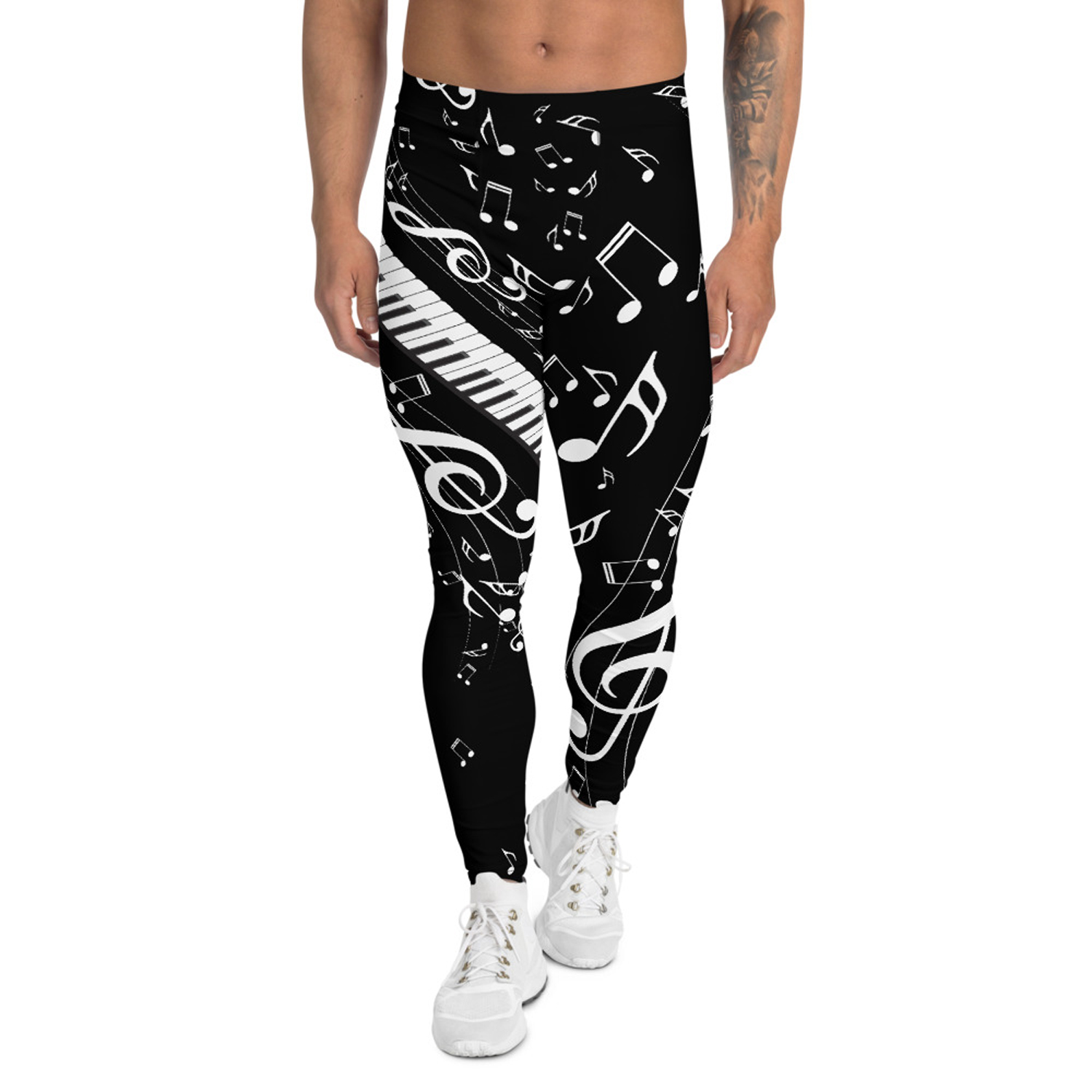 A pair of black leggings for men featuring a stylish music notes print, designed for comfort and performance during various activities.