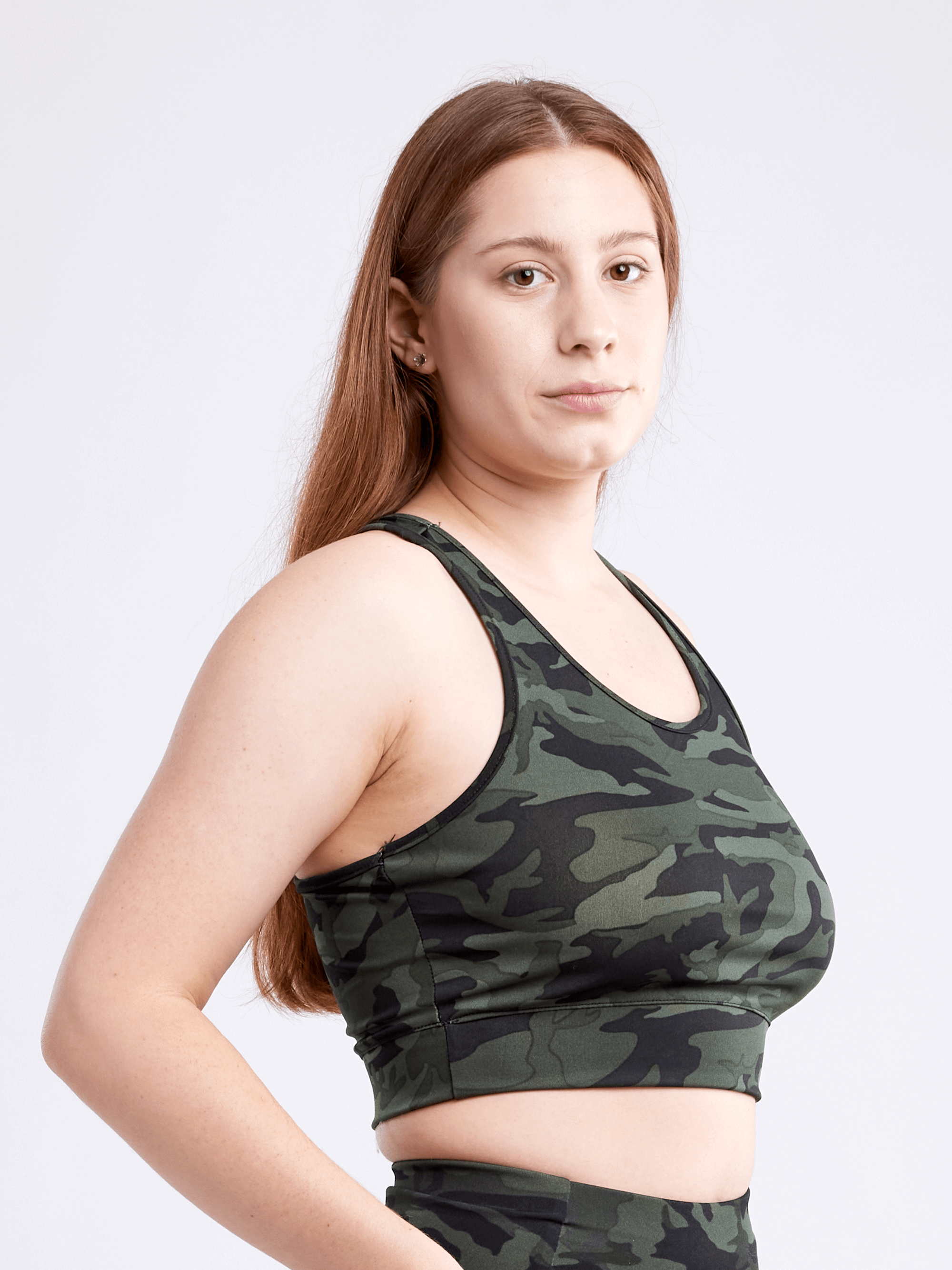 A lightweight women's racerback crop tank top in a stylish design, perfect for workouts and casual wear, showcasing its breathable fabric and seamless construction.