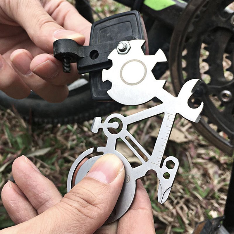 A compact Bicycle Multi Tool featuring various tools for bike repairs, showcasing its portable design and custom engraving option.