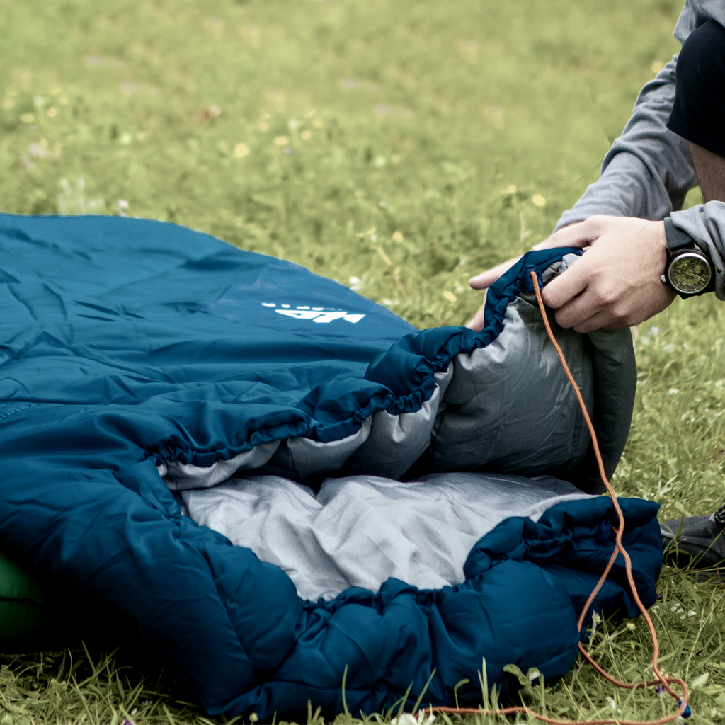 Camfy 30 Sleeping Bag featuring high-density polyester outer layer and soft recycled filling, designed for comfort and warmth during outdoor adventures.