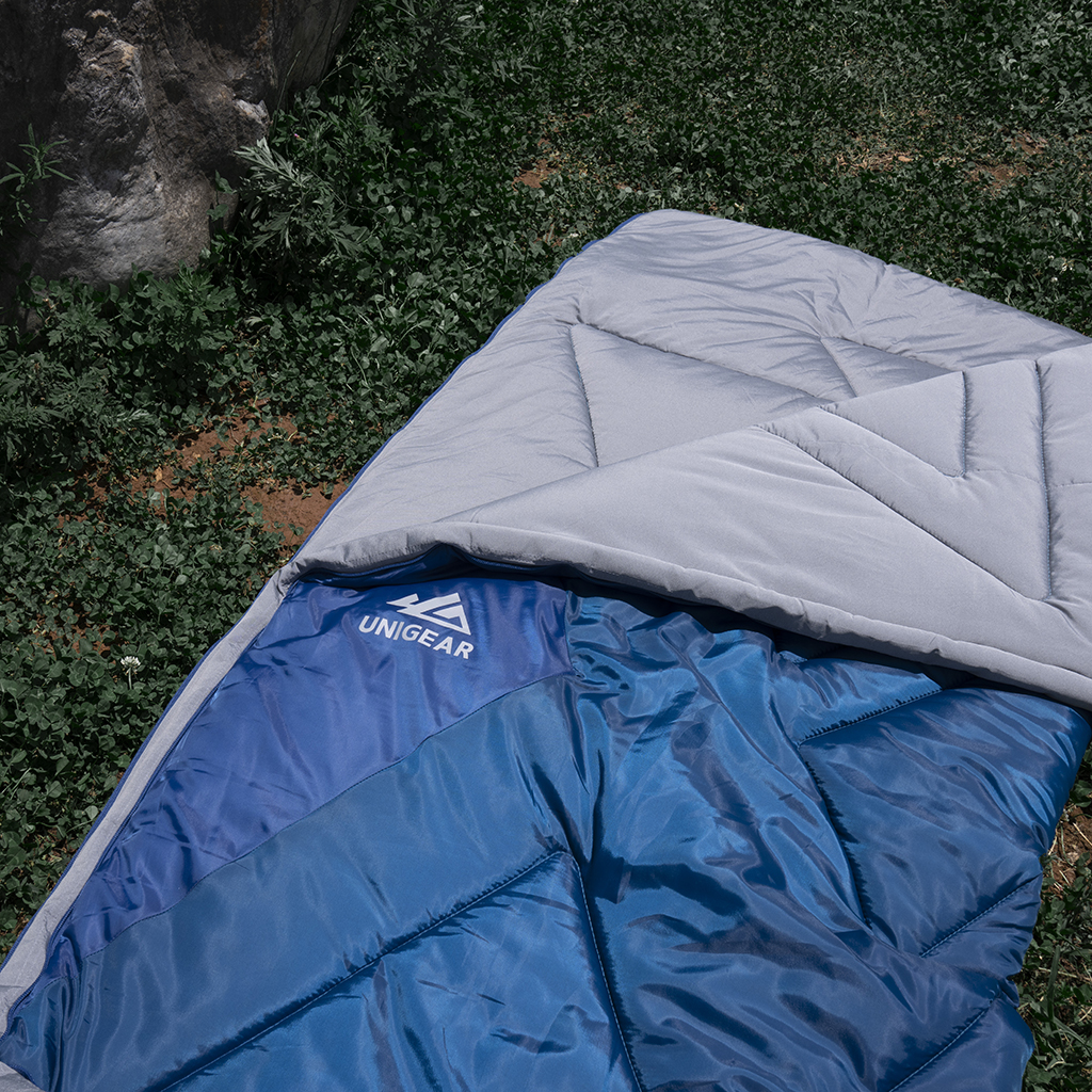 Camfy 50 Sleeping Bag showcasing soft lining, durable outer cover, and eco-friendly materials, perfect for outdoor adventures.