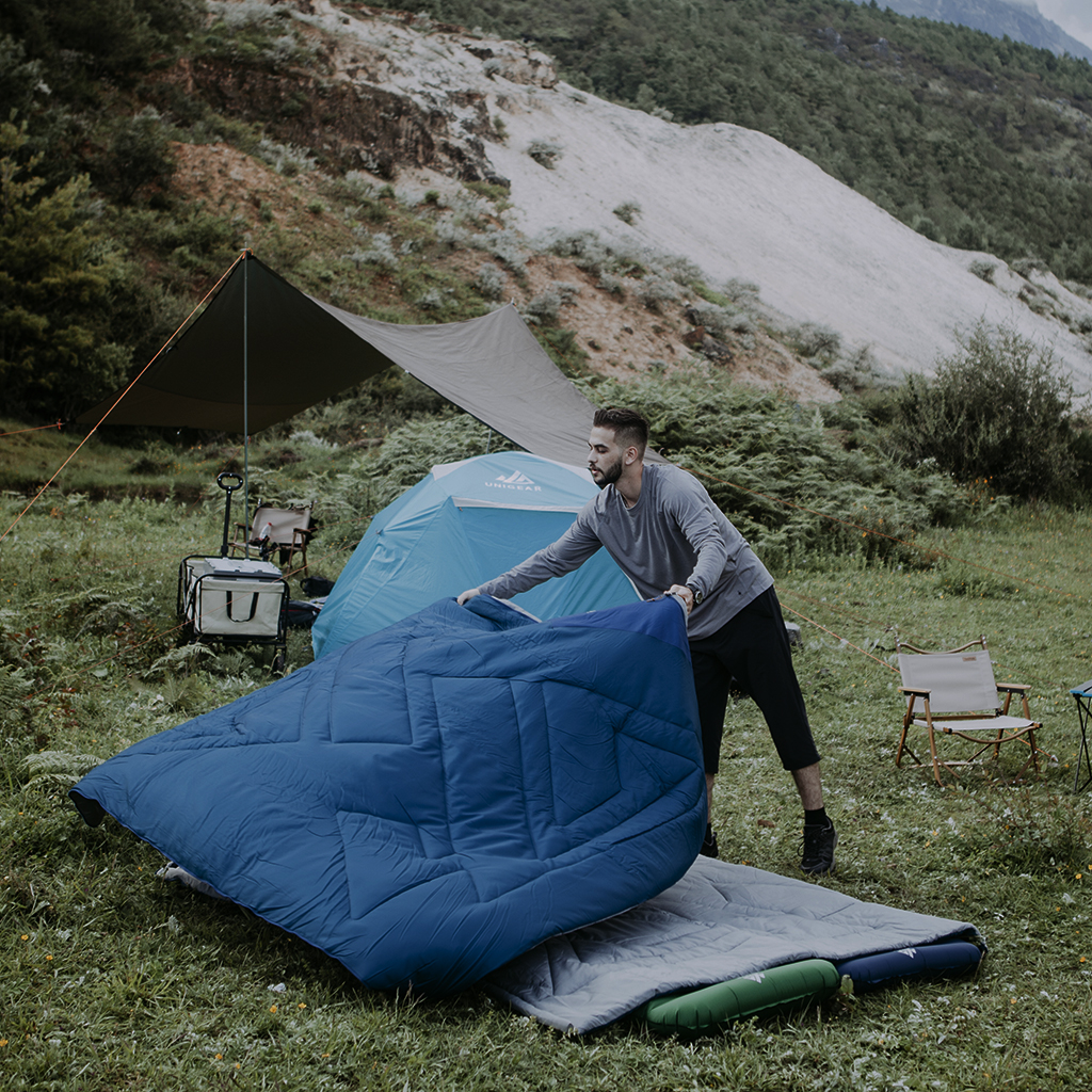 Camfy 50 Sleeping Bag showcasing soft lining, durable outer cover, and eco-friendly materials, perfect for outdoor adventures.