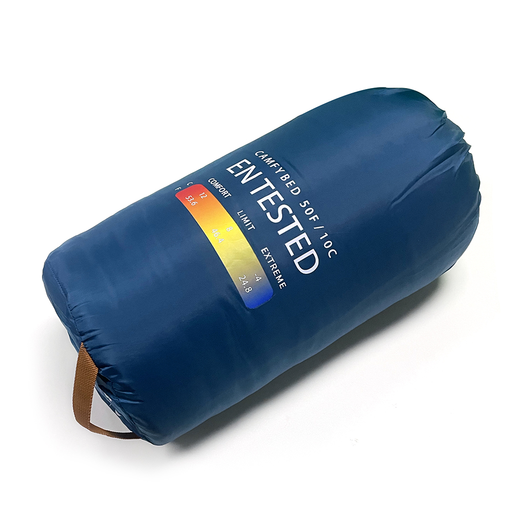 Camfy 50 Sleeping Bag showcasing soft lining, durable outer cover, and eco-friendly materials, perfect for outdoor adventures.