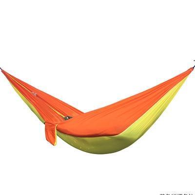 High Quality Portable Nylon Outdoor Backpacking Hammock in vibrant colors, showcasing its durable 210T nylon fabric and spacious design, ideal for outdoor relaxation.