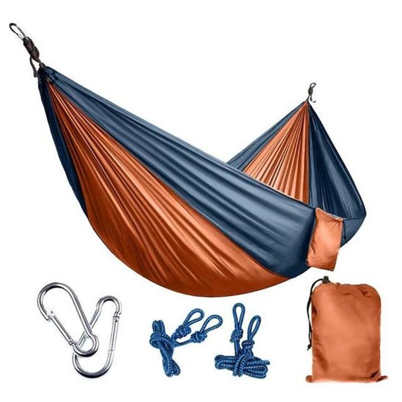 High Quality Portable Nylon Outdoor Backpacking Hammock in vibrant colors, showcasing its durable 210T nylon fabric and spacious design, ideal for outdoor relaxation.