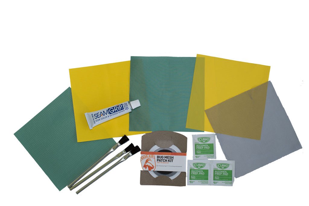 Night Sky Home & Field Repair Kit with various fabric patches, adhesive, and tools for repairing fabric rips and tears.