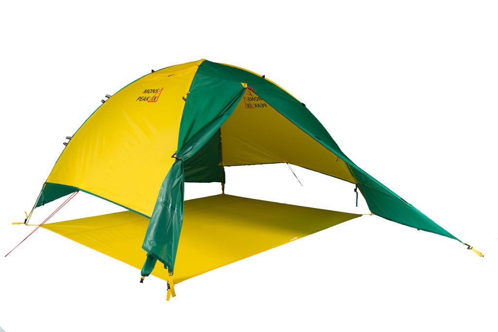 Trail 43 2-in-1 Backpacking Tent set up in a scenic outdoor location, showcasing its 3-person and 4-person configurations with vibrant green and yellow bases.