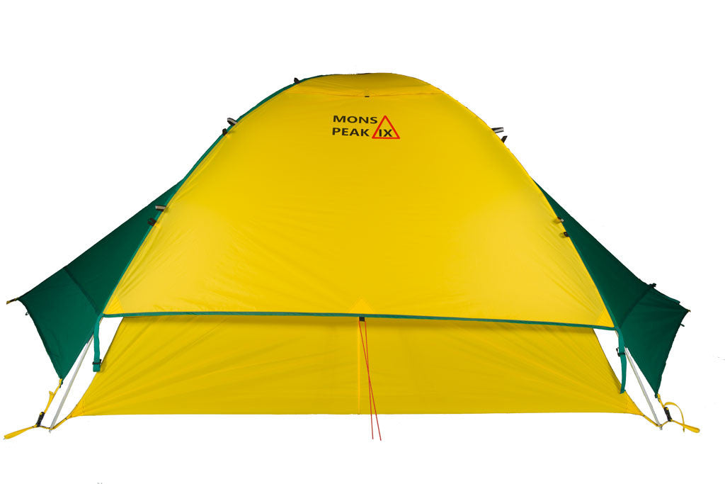 Trail 43 2-in-1 Backpacking Tent set up in a scenic outdoor location, showcasing its 3-person and 4-person configurations with vibrant green and yellow bases.