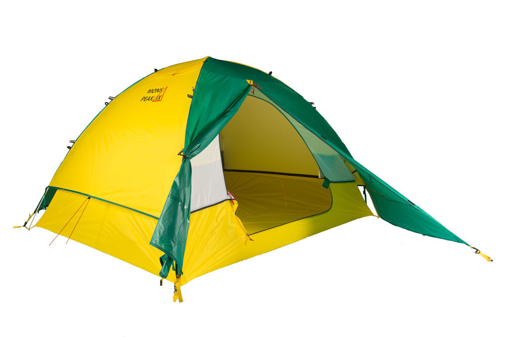 Trail 43 2-in-1 Backpacking Tent set up in a scenic outdoor location, showcasing its 3-person and 4-person configurations with vibrant green and yellow bases.