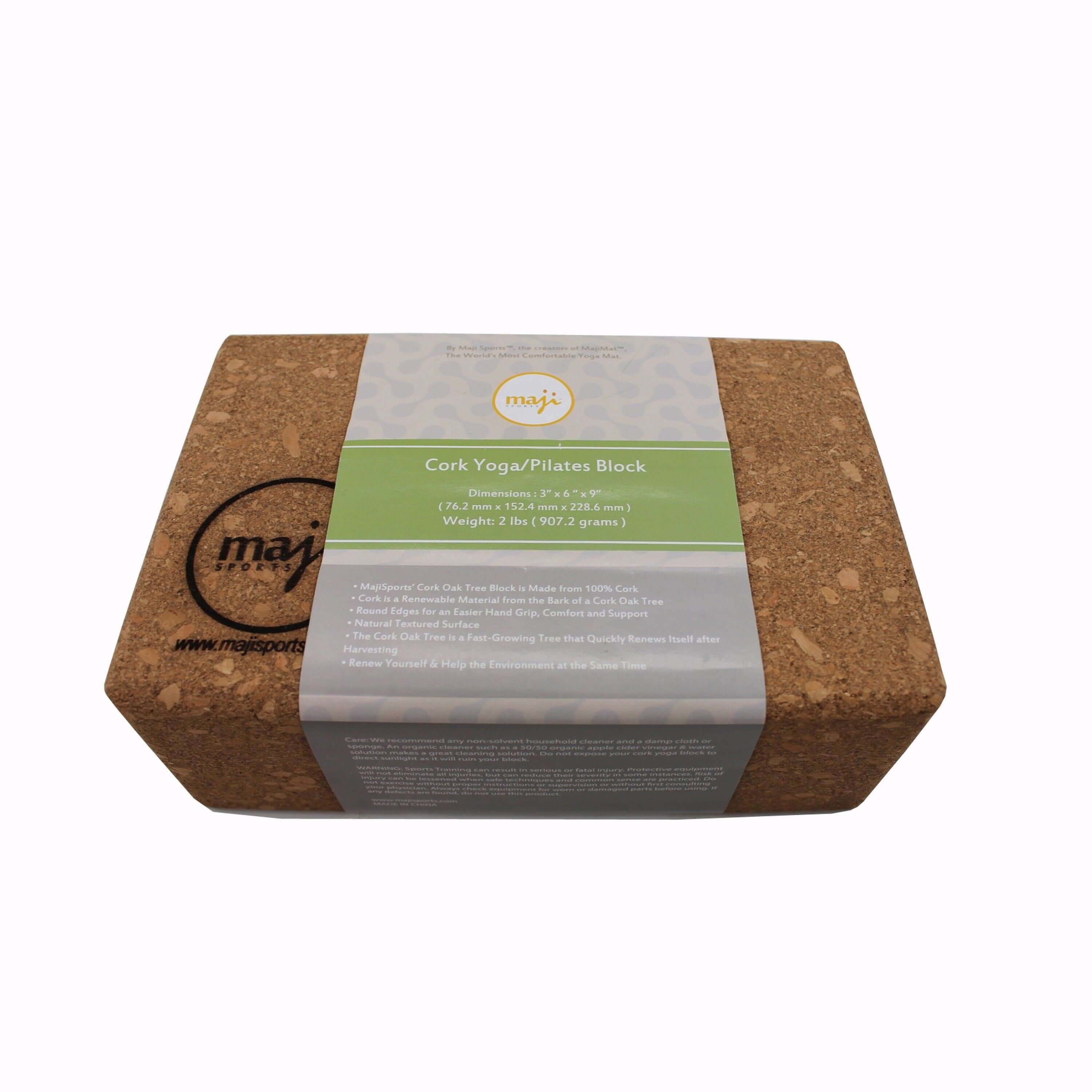 A 100% cork yoga and pilates block with round edges, showcasing its lightweight design and eco-friendly material, perfect for enhancing yoga practice.