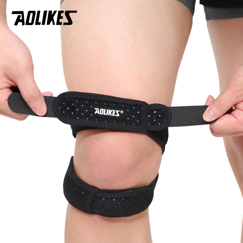 1PCS Sports Kneepad in black and pink, designed for patellar tendon support, adjustable fit for comfort during sports activities.