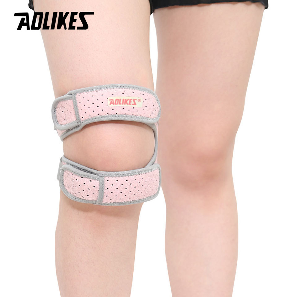 1PCS Sports Kneepad in black and pink, designed for patellar tendon support, adjustable fit for comfort during sports activities.