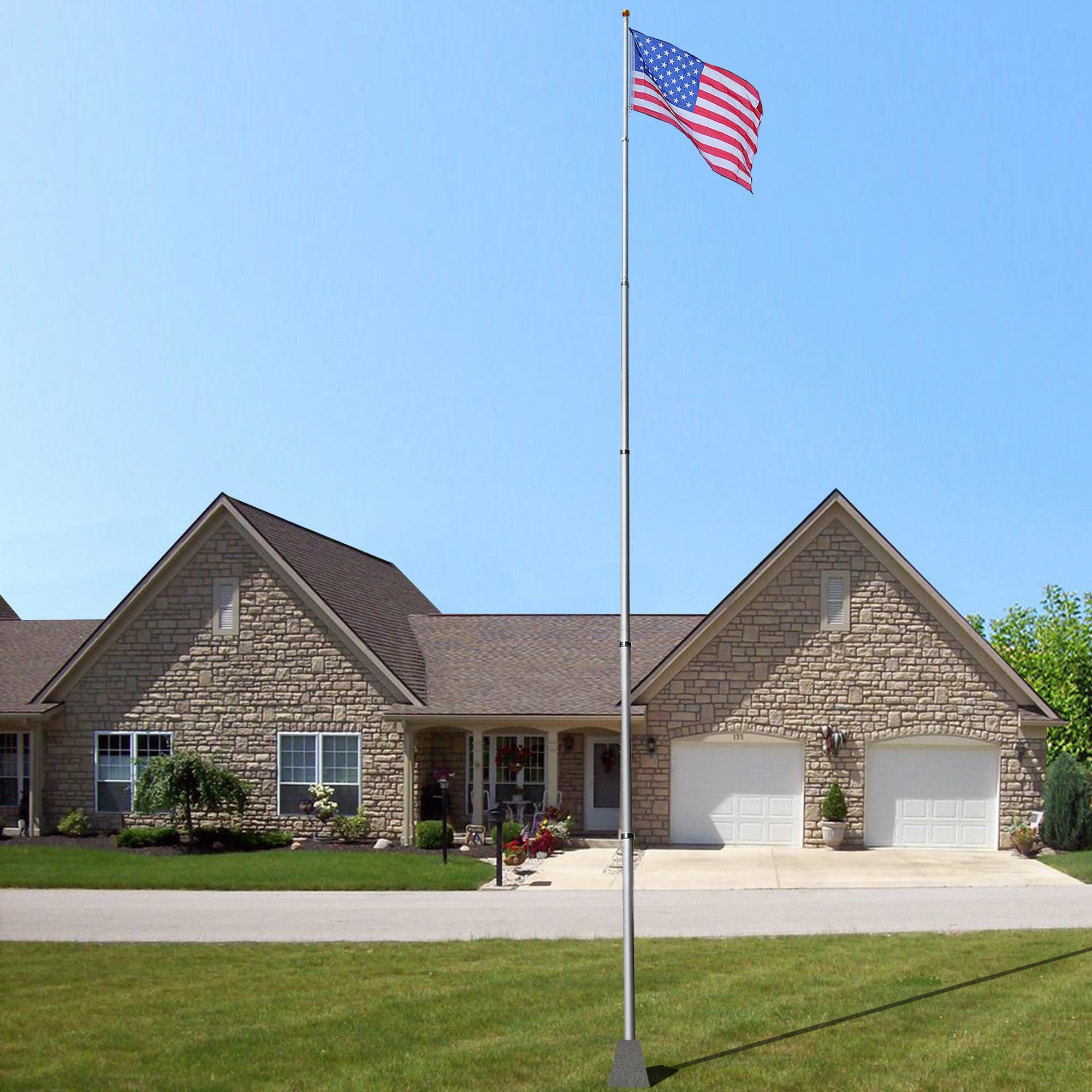 30 ft aluminum flag pole with US flag and decorative finials, showcasing its sturdy design and height.