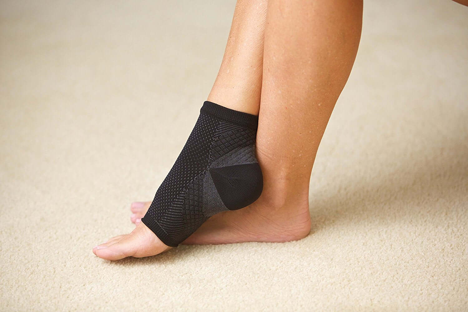 A pair of Anti-Fatigue Compression Socks designed for improved circulation and swelling relief, featuring a breathable fabric and targeted compression zones.