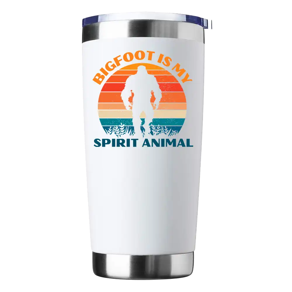 Bigfoot Is My Spirit Animal 20oz insulated tumbler with a vibrant design, showcasing its stainless steel construction and splash-proof lid.