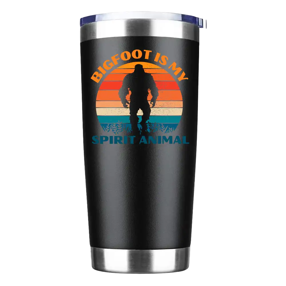 Bigfoot Is My Spirit Animal 20oz insulated tumbler with a vibrant design, showcasing its stainless steel construction and splash-proof lid.