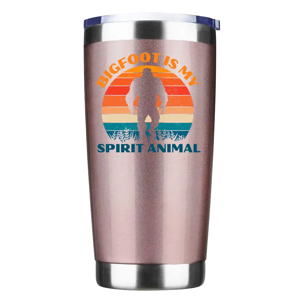 Bigfoot Is My Spirit Animal 20oz insulated tumbler with a vibrant design, showcasing its stainless steel construction and splash-proof lid.