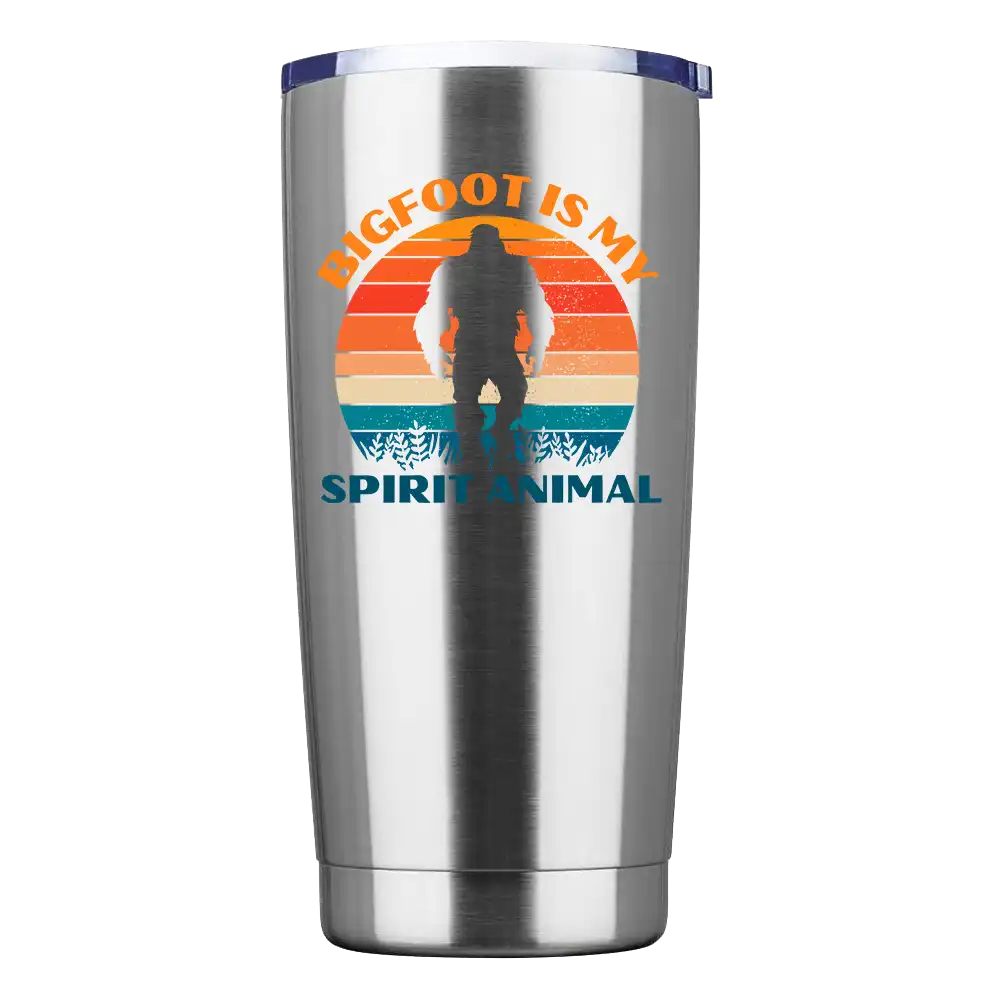 Bigfoot Is My Spirit Animal 20oz insulated tumbler with a vibrant design, showcasing its stainless steel construction and splash-proof lid.