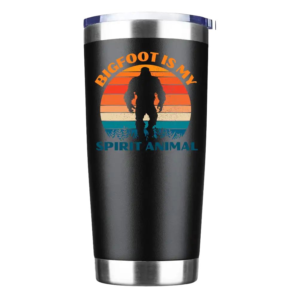 Bigfoot Is My Spirit Animal 20oz insulated tumbler with a vibrant design, showcasing its stainless steel construction and splash-proof lid.