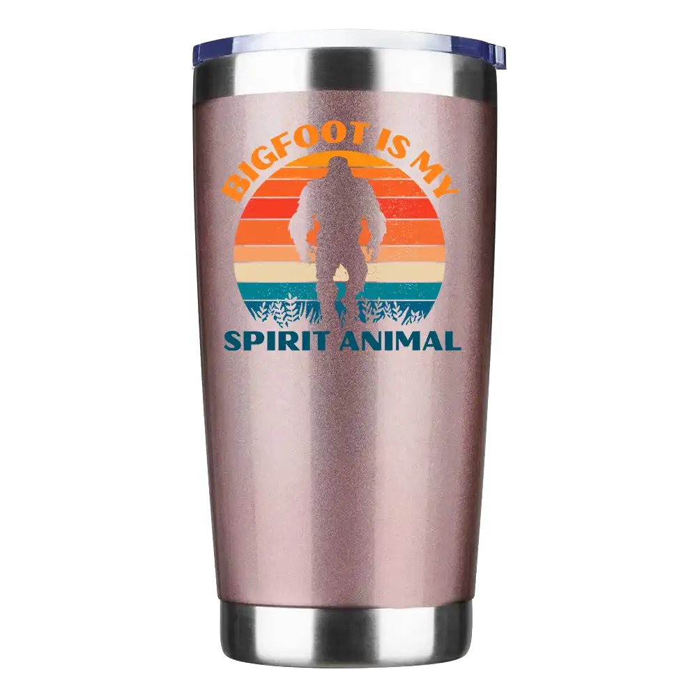 Bigfoot Is My Spirit Animal 20oz insulated tumbler with a vibrant design, showcasing its stainless steel construction and splash-proof lid.