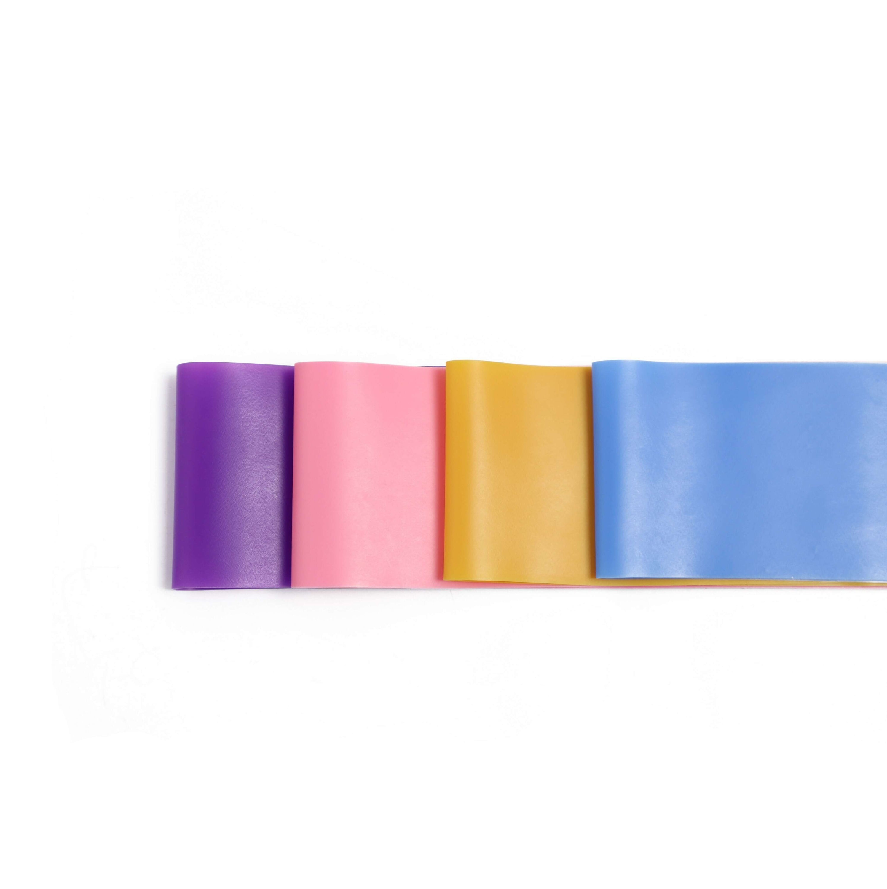 Booty Bands Variable Resistance 4 Pack featuring four colorful resistance bands in blue, yellow, pink, and purple, showcasing their varying resistance levels.