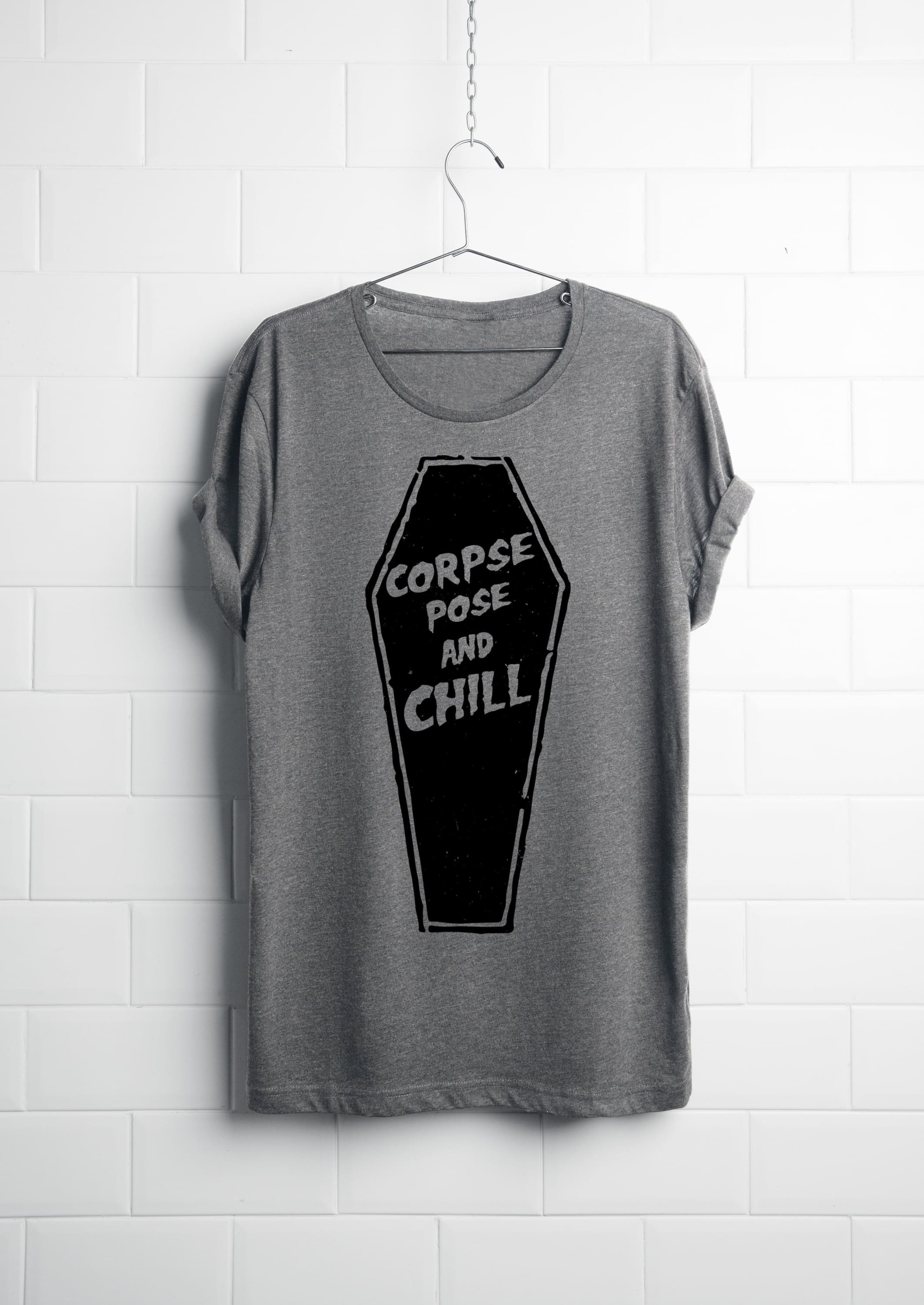 A stylish unisex tri-blend t-shirt featuring the phrase 'Corpse Pose and Chill', perfect for yoga enthusiasts.