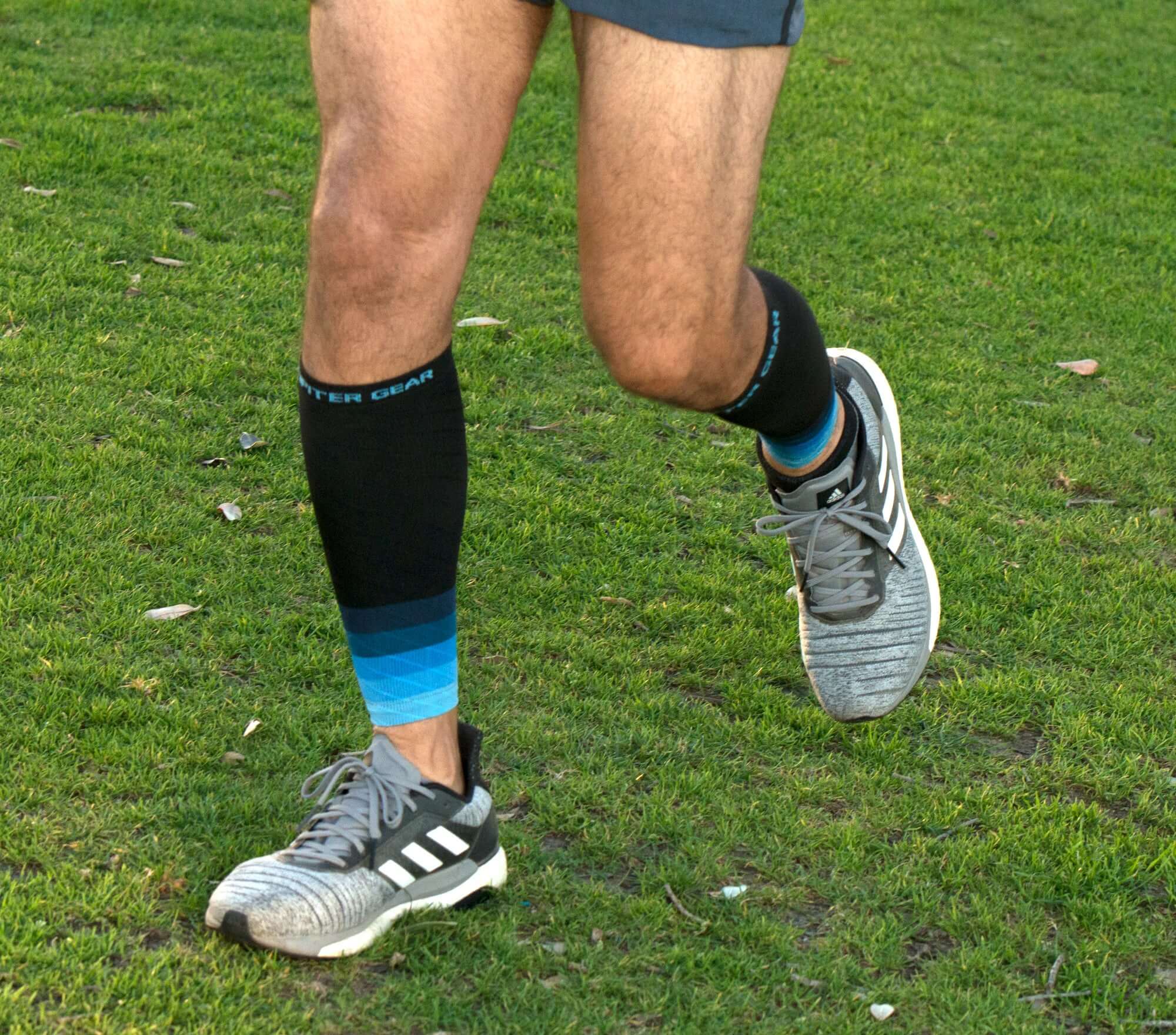 Endurance Compression Calf & Leg Sleeve designed for running and hiking, featuring gradient zoned compression panels for optimal support.